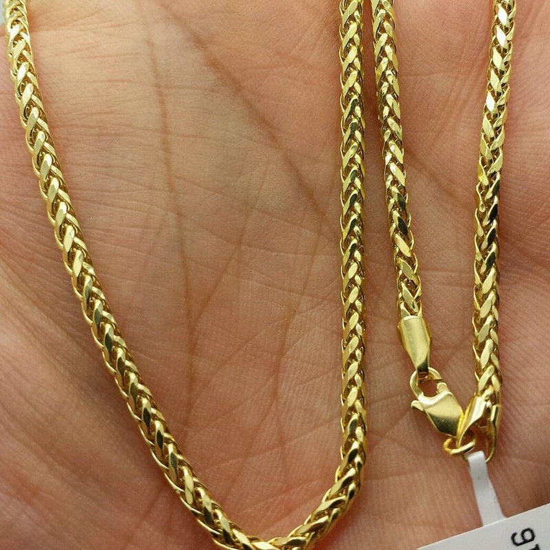 yellow gold franco chain on hand